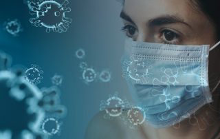 woman wearing mask ith animated viruses around her
