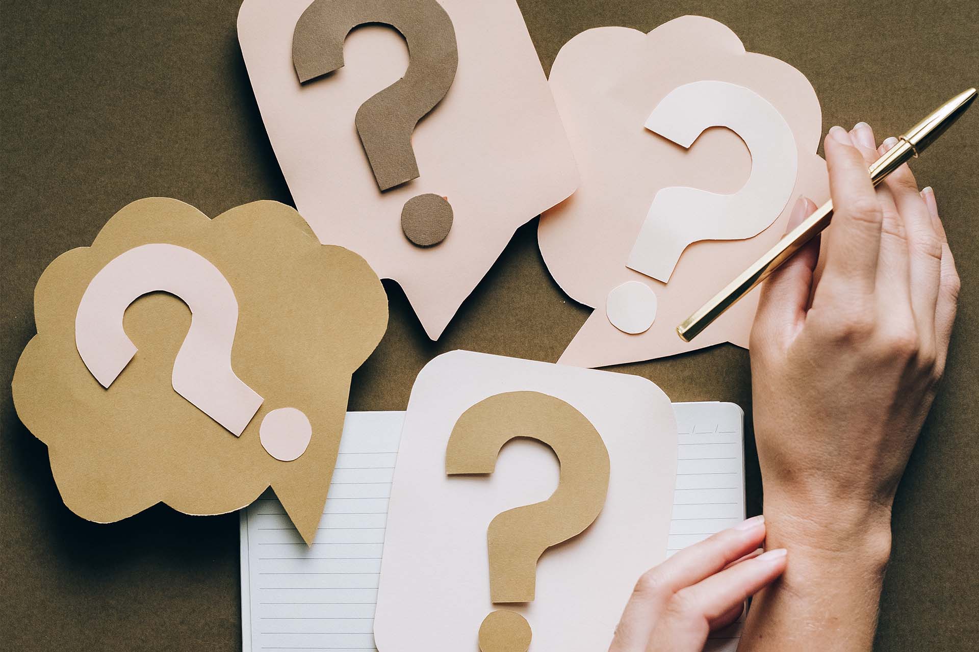 Question marks on a table